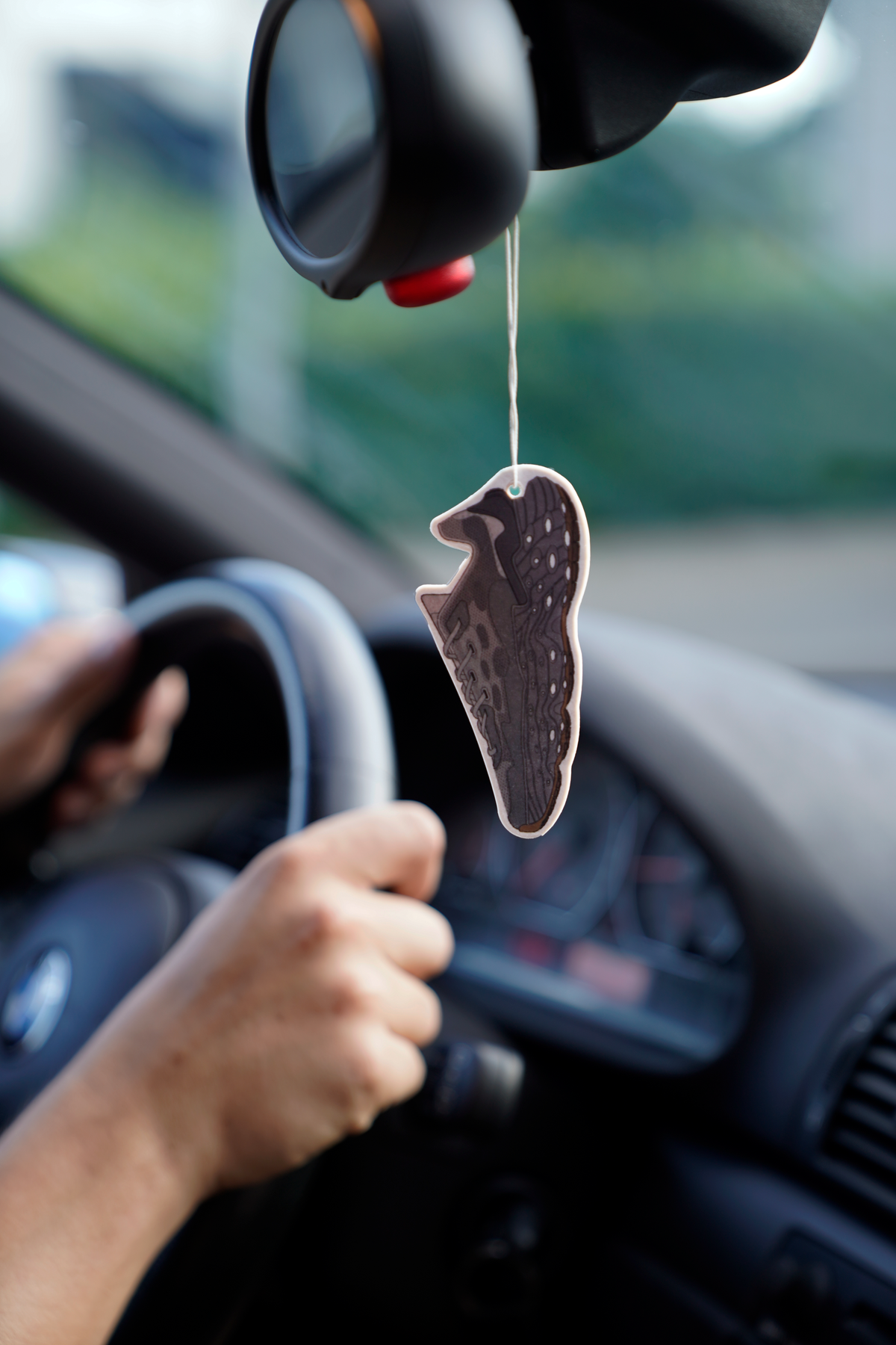 Flowers for Society Seed.One car fragrance grey front view hanging on rear-view mirror