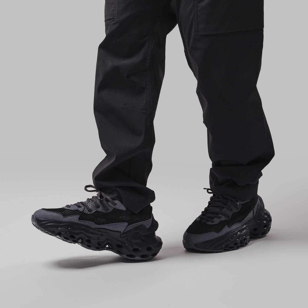 Flowers for Society Seed.One Black Mud Sneaker black worn by model