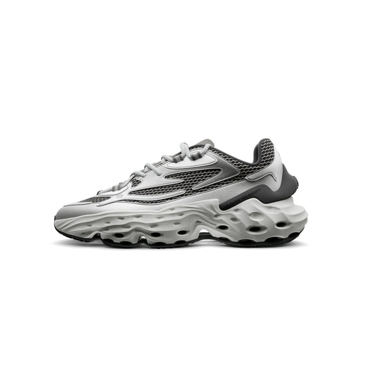 A pair of gray Seed.One STERLING athletic shoes with silver overlays and breathable mesh